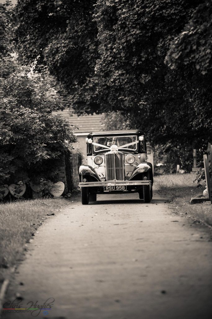 The Wedding Car Arriving at the wedding of John & Gill at St James Church, Bishop Auckland