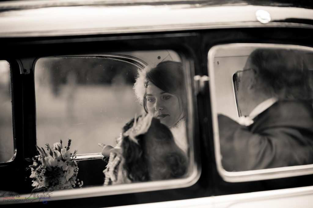 The Bride Arriving in the car at the wedding of John & Gill at St James Church, Bishop Auckland
