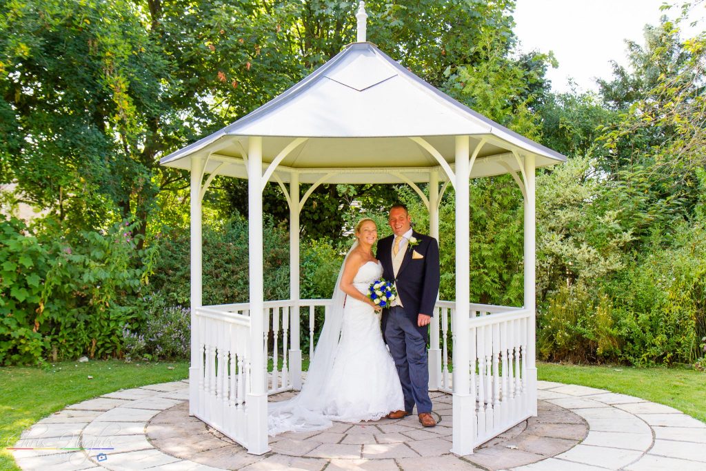 The Bride and Groom in the wedding gazebo, Manor House Hotel, West Auckland